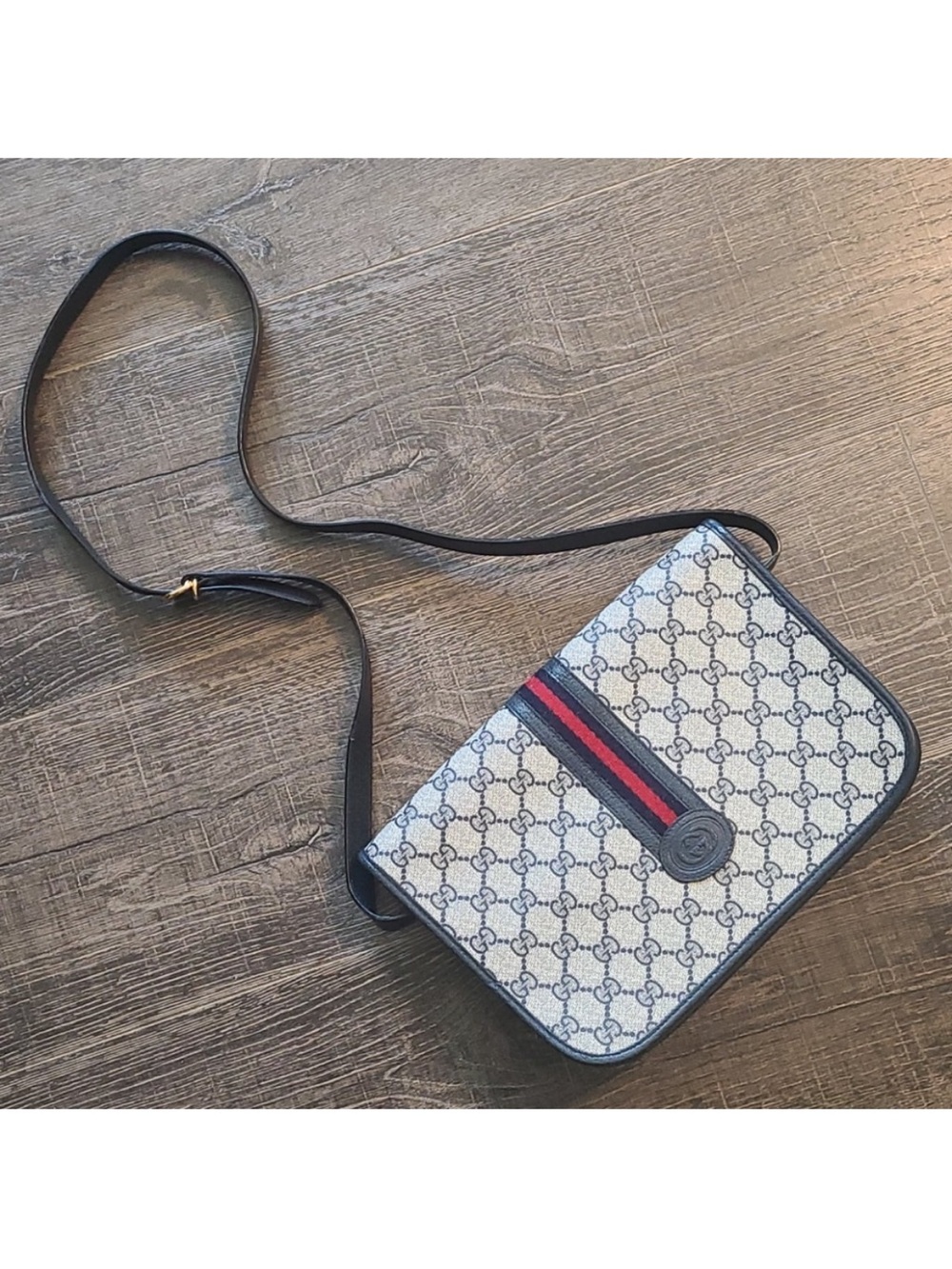 Gucci Navy Blue Monogram Crossbody Bag with Classic Midline Red-Blue Stripe.